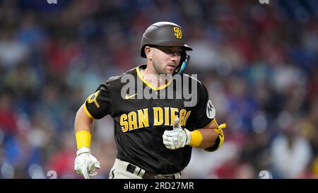 San Diego Padres' Matthew Batten, right, is tagged out by Philadelphia  Phillies second baseman Edmundo Sosa after trying to steal second during  the fifth inning of the first baseball game in a