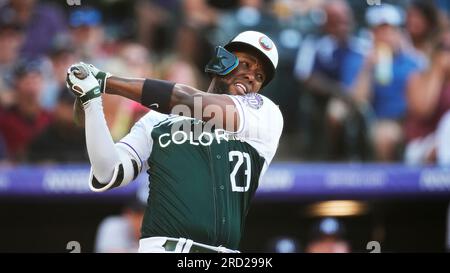 Colorado Rockies left fielder Jurickson Profar (29) wears a pair of Nike  cleats featuring the face of the team's mascot, Dinger the dinosaur, in the  ninth inning of a baseball game Tuesday