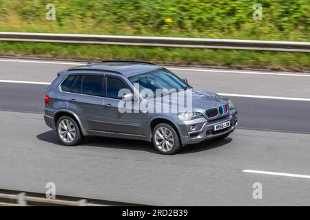 https://l450v.alamy.com/450v/2rd2b39/2009-bmw-x5-xdrive-30d-msport-5s-a-30d-step-auto-grey-car-suv-diesel-2993-cc-travelling-at-speed-on-the-m6-motorway-in-greater-manchester-uk-2rd2b39.jpg