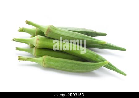 Close-up of organic green fresh Okra or ladies' fingers fruits(  Abelmoschus esculentus )  isolated over white background Stock Photo