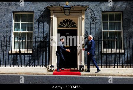 President of the USA Joe Biden is greeted by British Prime Minister Rishi Sunak on the steps of 10 Downing Street, London, England. Stock Photo