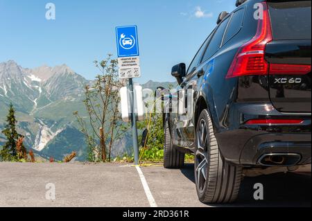 Les Arcs, France. 11th July, 2023. Reserved parking for electric cars, facing Mont Blanc, Les Arcs 1800, Le Chantel, France on July 11, 2023. Photo by Helder Januario/Abacapress Credit: Abaca Press/Alamy Live News Stock Photo