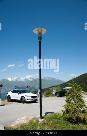 Les Arcs, France. 11th July, 2023. Reserved parking for electric cars, facing Mont Blanc, Les Arcs 1800, Le Chantel, France on July 11, 2023. Photo by Helder Januario/Abacapress Credit: Abaca Press/Alamy Live News Stock Photo