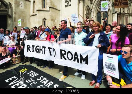 London, UK. 18th July 2023. Protest outside Royal Courts of Justice supporting the right to wild camping on Dartmoor. Inside the High Court hears an appeal brought by Dartmoor National Park Authority to reinstate the public's right to wild camp on Dartmoor. The original right was overturned by a High Court ruling in January 2023 following a case brought by wealthy landowner Alexander Darwall. Rally organised by The Stars Are For Everyone and Right to Roam. Credit: Stephen Bell/Alamy Live News Stock Photo