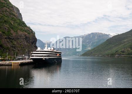 Around Flåm - World Traveller - cruise ship berthed in Flåm Stock Photo