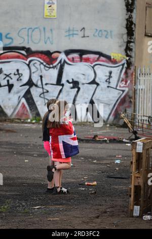 Protestant girls at a Sandy Row street party waiting for the bonfire lighting on Eleventh Night Stock Photo