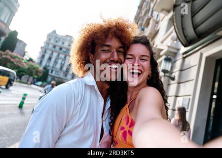 tourists couple of tourists taking selfie in Barcelona, Spain Stock Photo