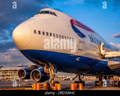 A British Airways Boeing 747-400 G-BNLX aircraft in the late afternoon sunshine at London Heathrow Airport ,UK Stock Photo