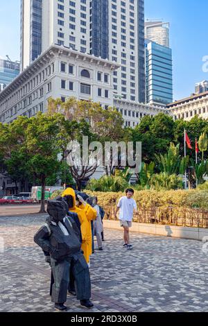 Statues and tourist at Hong Kong Cultural Centre, Kowloon, Hong Kong, SAR, China Stock Photo