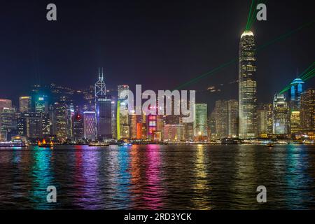 Hong Kong skyline at night with laser show, Victoria Harbour, SAR, China Stock Photo