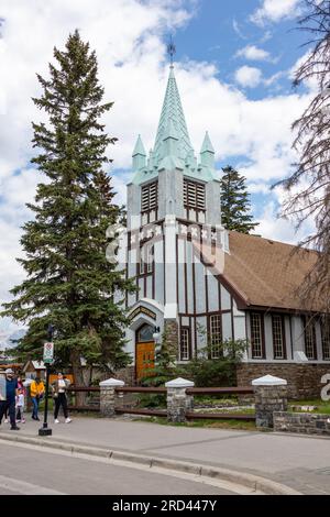 BANFF, CANADA - JULY 5, 2023: The historic St Paul's Presbyterian Church on Banff Avenue in the Canadian Rockies was built in 1930 using local stone a Stock Photo