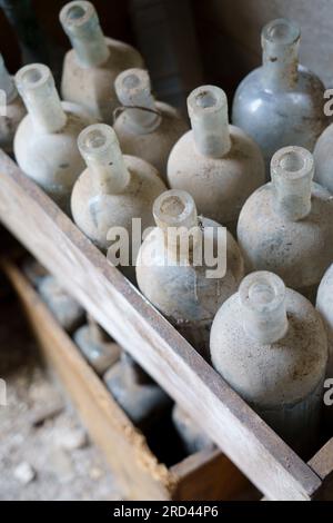 old empty bottles, essences for alcoholic beverages, old Ripoll winery, Llucmajor,  Majorca, Balearic Islands, Spain Stock Photo