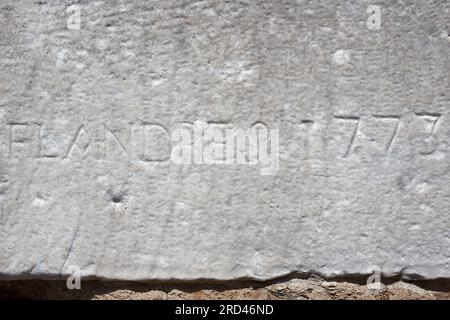 Ancient vandals in Rome - Visitors (1773) carving their names into the walls of Saint Sebastian Gate (Porta San Sebastiano or Porta Appia) - Rome Stock Photo