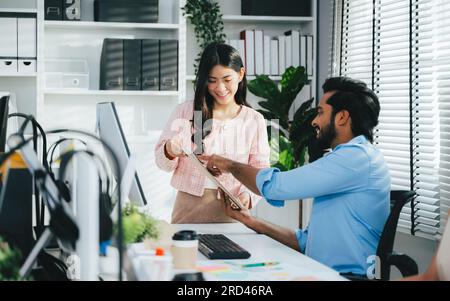 Couple of business people working together at modern office, Business team meeting and brainstorming at company, Employees using laptop working with Stock Photo