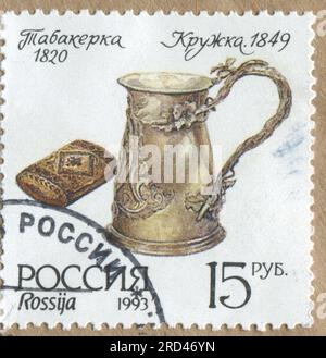 RUSSIA KALININGRAD, 3 JUNE 2015: stamp printed by Russia, shows mug old silver, circa 1993 Stock Photo