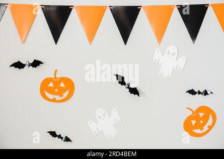 Bright Halloween background with light gray wall decorated for holiday Stock Photo