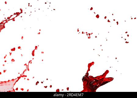 Red splashes isolated on white background. Stock Photo