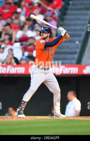 ANAHEIM, CA - JULY 16: Kyle Seager (15) is congratulated after he hit a two  run home run in the third inning against the Los Angeles Angels on July 16,  2021 at