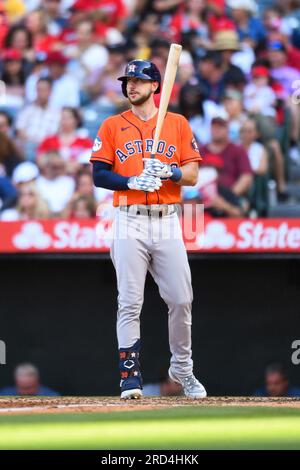 ANAHEIM, CA - JULY 16: Kyle Seager (15) is congratulated after he hit a two  run home run in the third inning against the Los Angeles Angels on July 16,  2021 at