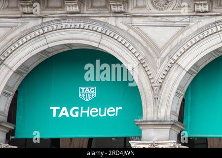 Milan , Italy  - 07 10 2023 : Tag Heuer logo brand chain and text sign front facade store watches swiss manufacturing company Stock Photo