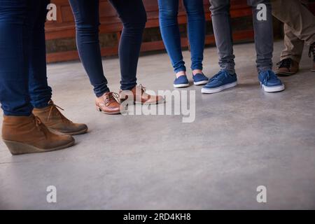 Campus life. Closeup shot of university students standing on campus. Stock Photo