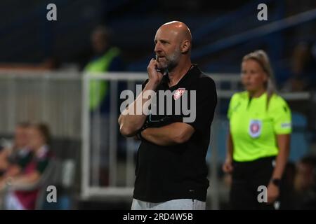 Opava, Czech Republic. 18th July, 2023. Czech head coach Karel Rada follow the warm-up women match Czech Republic vs Northern Ireland in Opava, Czech Republic, July 18, 2023. Credit: Jaroslav Ozana/CTK Photo/Alamy Live News Stock Photo