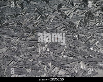 Ice crystals in the garden pond, ice patterns, ice formations, ice structure Stock Photo