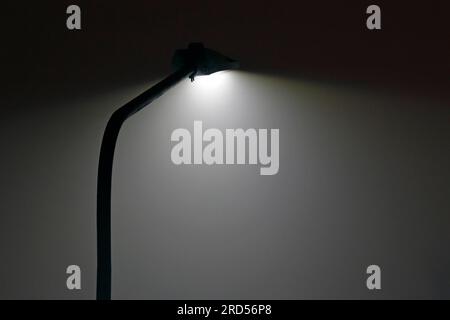 LED street lamp lights up at night Stock Photo