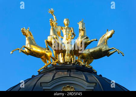 Quadriga on roof, gilded, Apollo, god of light on four-in-hand chariot, four horses, carrying torch as symbol of the sun, temple of the sun Stock Photo