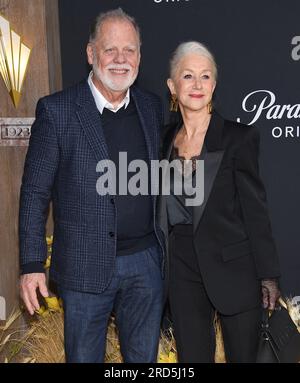 December 2, 2022, Los Angeles, California, USA: Taylor Hackford and Helen Mirren arrives for the â€˜1923â€™ Hollywood Premiere in Hollywood, CA. (Credit Image: © Lisa O'Connor/ZUMA Press Wire) EDITORIAL USAGE ONLY! Not for Commercial USAGE! Stock Photo