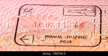 Czech Republic border crossing stamp in an open passport. Praha Ruzyne exit passport stamp 2019 Stock Photo