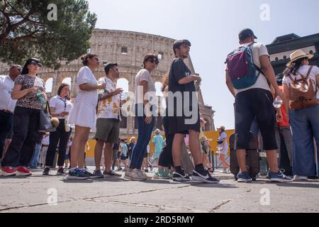 Rome, Italy. 18th July, 2023. Tourists queuing for water at an ACEA vending machine in front of the Colosseum in Rome (Photo by Matteo Nardone/Pacific Press) Credit: Pacific Press Media Production Corp./Alamy Live News Stock Photo