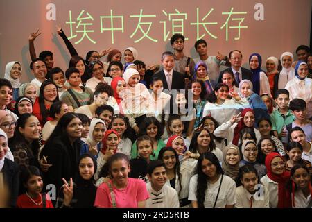 Cairo, Egypt. 18th July, 2023. People pose for photos at the closing ceremony of the first Chinese language summer camp in Cairo, Egypt, on July 18, 2023. More than 100 students from Egyptian governmental preparatory schools celebrated on Tuesday the conclusion of their first Chinese language summer camp. Credit: Ahmed Gomaa/Xinhua/Alamy Live News Stock Photo