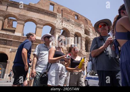 Rome, RM, Italy. 18th July, 2023. Tourists queuing for water at an ACEA vending machine in front of the Colosseum in Rome, on a hot summer day (Credit Image: © Matteo Nardone/Pacific Press via ZUMA Press Wire) EDITORIAL USAGE ONLY! Not for Commercial USAGE! Stock Photo