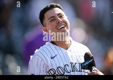 Colorado Rockies second baseman Alan Trejo (13) celebrates after hitting a  solo, walk-off home run against New York Yankees relief pitcher Ron  Marinaccio (97) in the 11th inning of a baseball game