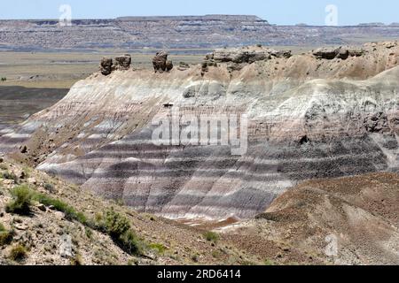 Ancient and colorfully striated geological rock layers and formations of the Painted Desert in Petrified Forest National Park, Arizona, USA Stock Photo