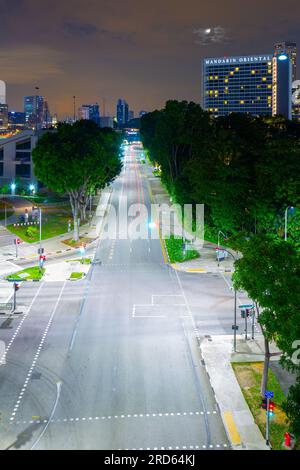 A night view of Raffles Avenue in Singapore at its intersection with Temasek Avenue at the Bayfront Bridge, seen from the Benjamin Sheares Bridge. Stock Photo