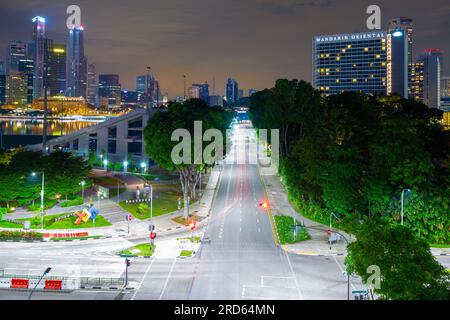 A night view of Raffles Avenue in Singapore at its intersection with Temasek Avenue at the Bayfront Bridge, seen from the Benjamin Sheares Bridge. Stock Photo