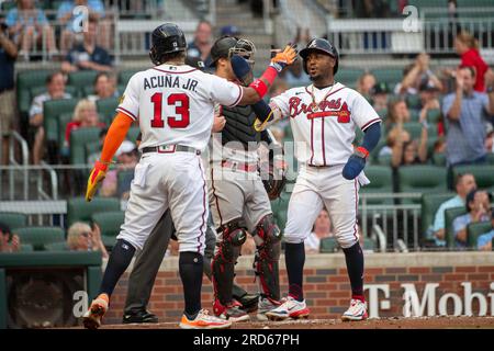 Atlanta, GA, USA. 04th July, 2019. Atlanta Braves infielder Ozzie Albies  (left) celebrates with outfielder Ronald Acu-a Jr. (right) after winning a  MLB game against the Philadelphia Phillies at SunTrust Park in