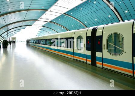 Maglev train (derived from magnetic levitation) is the first commercially operated high-speed magnetic levitation line in the world Stock Photo