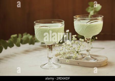 Aesthetic green healthy avocado cocktails. Low alcohol, zero proof drinks. Natural light Stock Photo