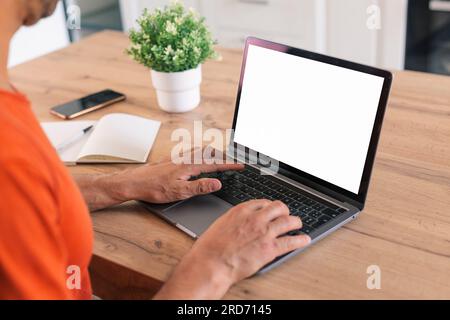 mockup image blank screen computer,cell phone with white background for advertising text,hand man using laptop texting mobile contact business search Stock Photo