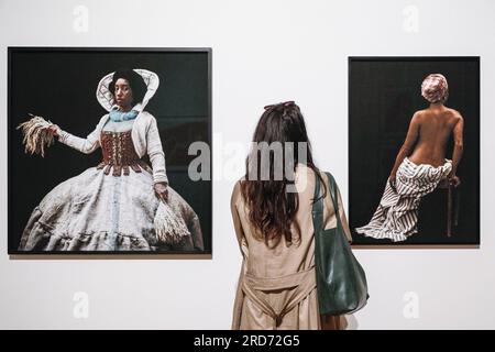 London, UK. 19th July, 2023. A visitor looks at Ayana V Jackson, Black Rice, 2019 and Ayana V Jackson, Anarcha, 2017. 'Black Venus - Reclaiming Black Women in Visual Culture' is an exhibition examining the historical representation and shifting legacy of Black women in visual culture. Over 40 artworks are on display at Somerset House 20 Jul - 24 Sep 2023. Credit: Imageplotter/Alamy Live News Stock Photo