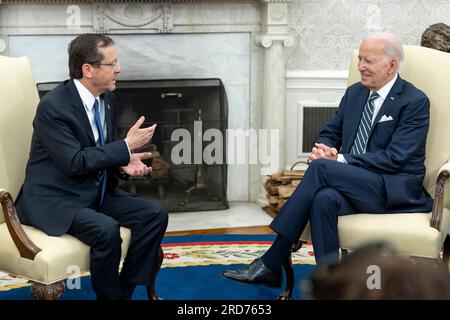 Washington, United States Of America. 18th July, 2023. Washington, United States of America. 18 July, 2023. U.S President Joe Biden, right, listens to Israeli President Isaac Herzog, left, during bilateral discussions at the Oval Office of the White House, July 18, 2023 in Washington, DC Credit: Adam Schultz/White House Photo/Alamy Live News Stock Photo