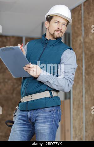 close-up portrait of a smart builder thinking about something Stock Photo