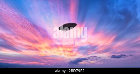 An Unidentified Flying Object Saucer Is Hovering In The Colored Surreal Sky Stock Photo