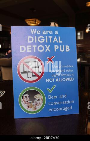 Digital detox pub sign - mobile phones banned - inside Sam Smiths pub, The Ivanhoe, Sprotbrough, Doncaster, South Yorkshire, England, UK Stock Photo