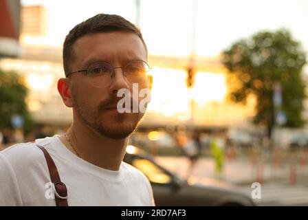 street style portrait of a man in sunset Stock Photo