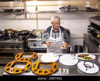 Chef and cook in the kitchen of Orient Restaurant Goreme Cappadocia Stock Photo