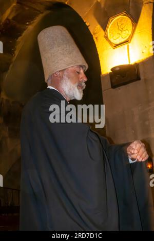 Head of the sufi whirling dervishes from  Mevlevi order in Turkey before the ceremony of Sama dance. Cappadocia Turkey Stock Photo